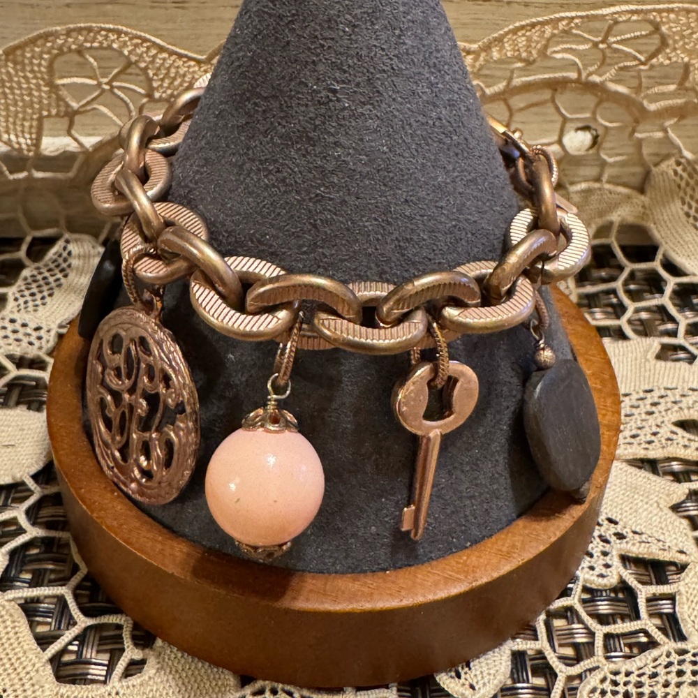 Rose gold tone chunky charm bracelet